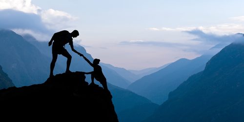 Scaling the heights Mountaineers help each other to achieve