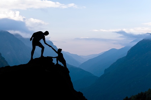Scaling the heights Mountaineers help each other to achieve
